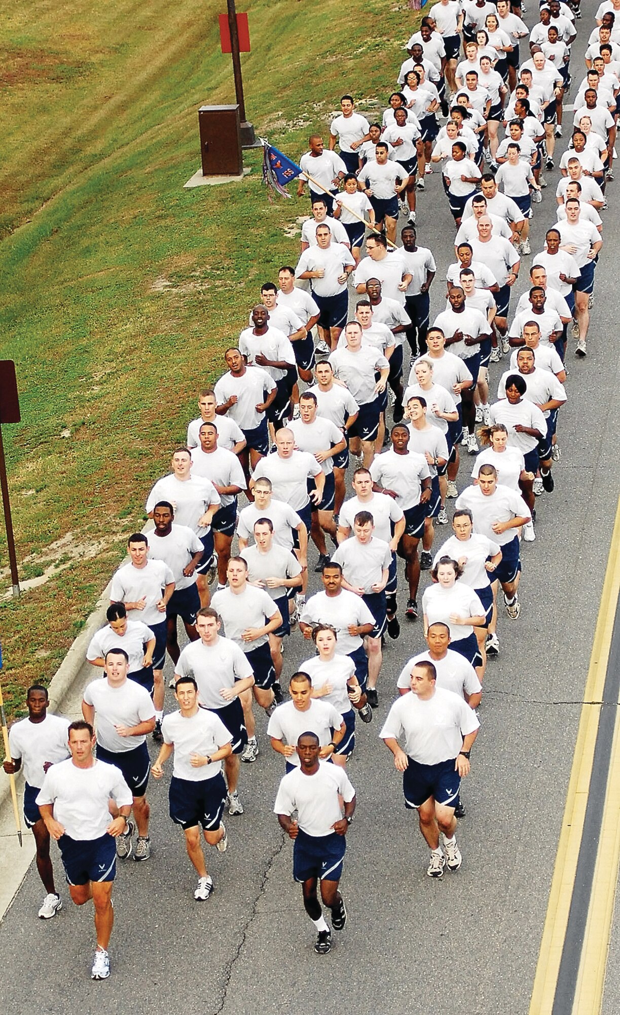 Members of the 43rd Force Support Squadron and 43rd Communication Squadron participate in the Wing Run held on July 10. (U.S. Photo by Mike Murchison)
