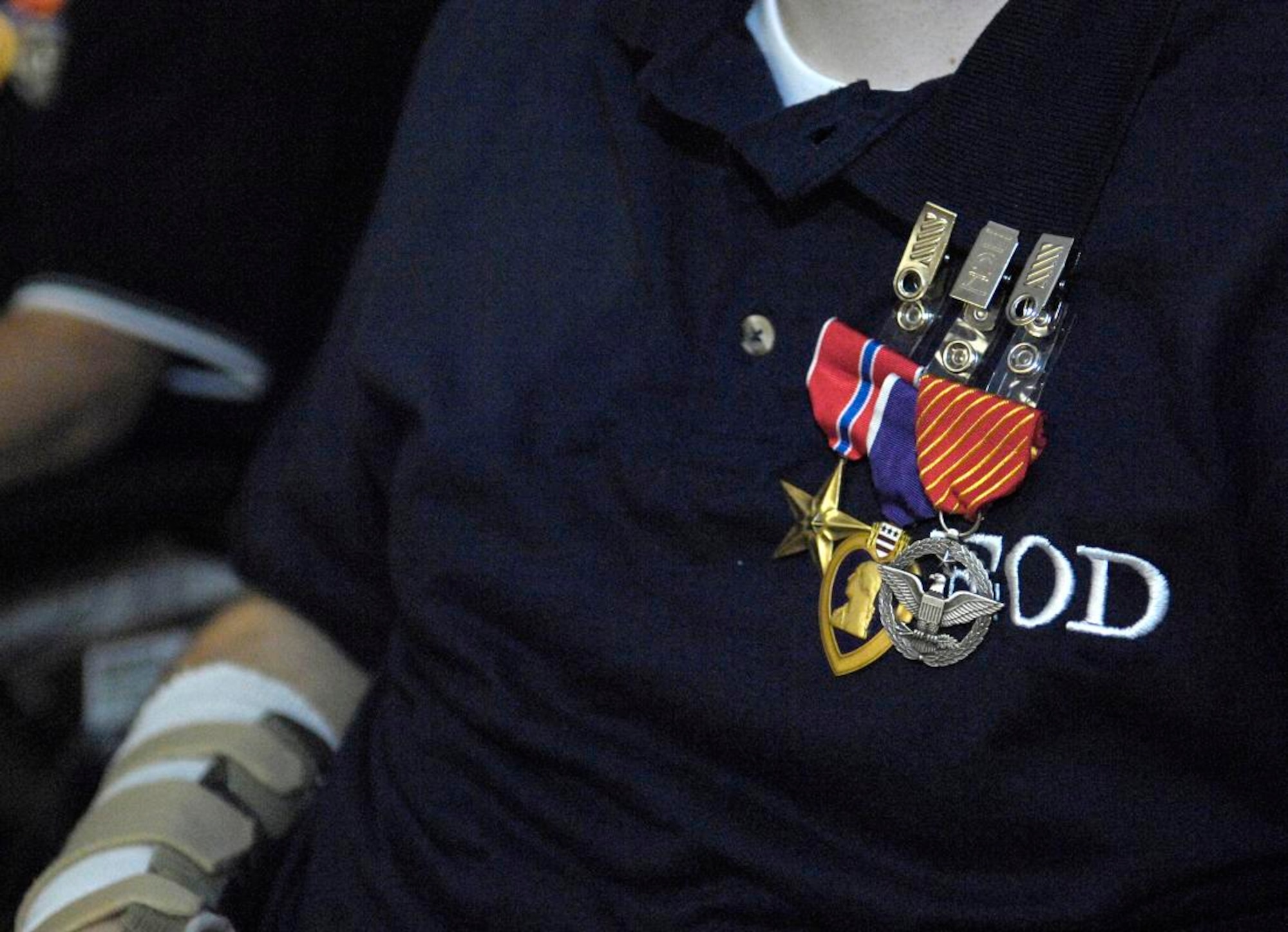 Staff Sgt. David Flowers proudly wears his medals after a ceremony at Walter Reed Army Medical Center.  Air Force Chief of Staff Norton Schwartz presented Sergeant Flowers with a Bronze Star, Purple Heart and a second Combat Action Medal June 23 for his actions and selfless service while deployed to Afghanistan.