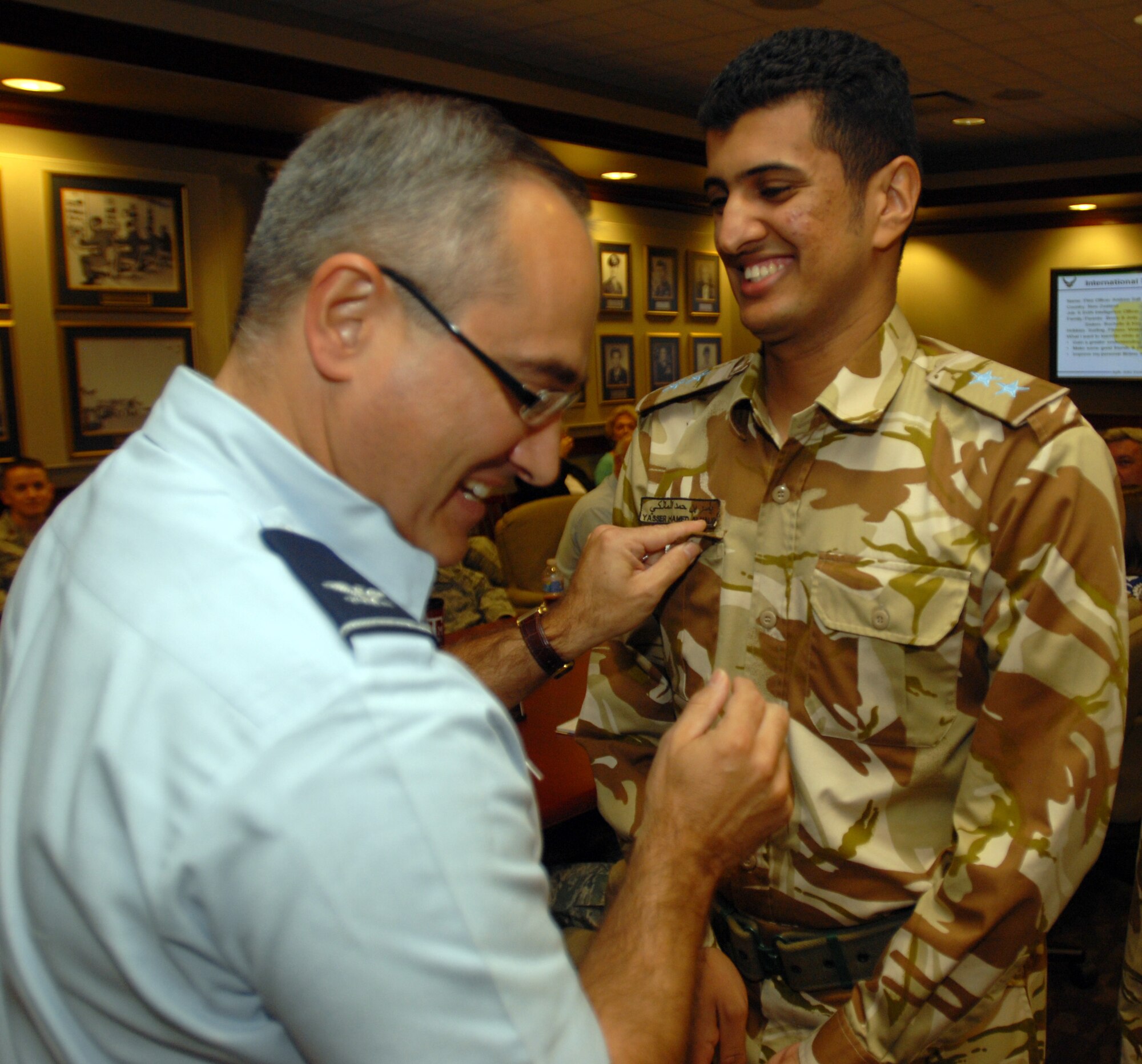 1st Lt. Yasser AL-Malki, an Intelligence Officer, Royal Air force, Sultanate Of Oman was promoted to first lieutenant on June 30, by Col. Anthony Lombardo, 17th Training Group commander, at a wing staff meeting at Goodfellow. (U.S. Air Force photos by Airman Clayton Lenhardt)  

