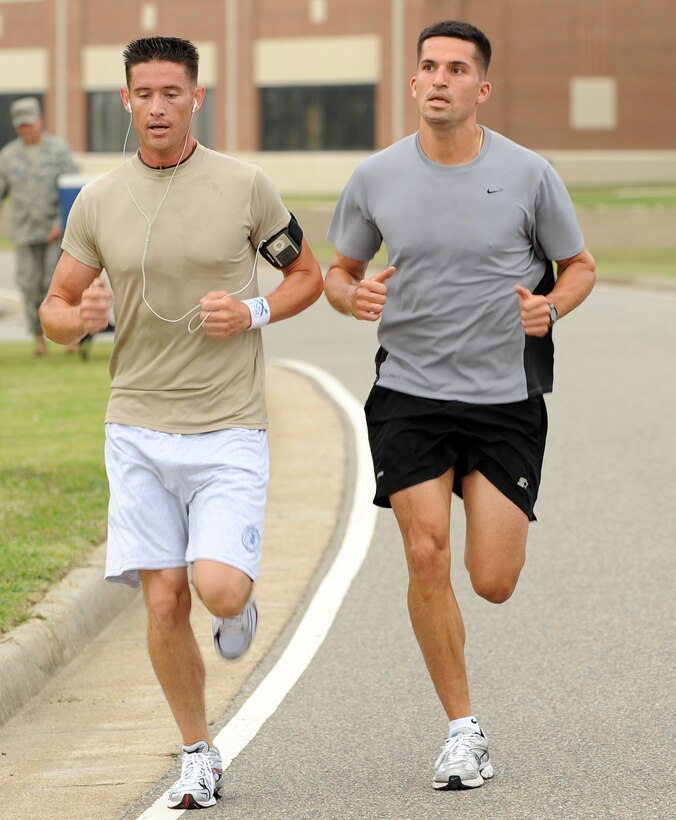 LANGLEY AIR FORCE BASE, Va. -- First Lt. Brandon Bryan, 1st Logistic Readiness Squadron fuels commander, and Capt. Elias Guerra, Air Combat Command protocol, race to the finish of the Run for the Rocker 5K here July 17. More than 50 participants signed up and ran in the event. (U.S. Air Force photo/Airman 1st Class Jonathan Koob)