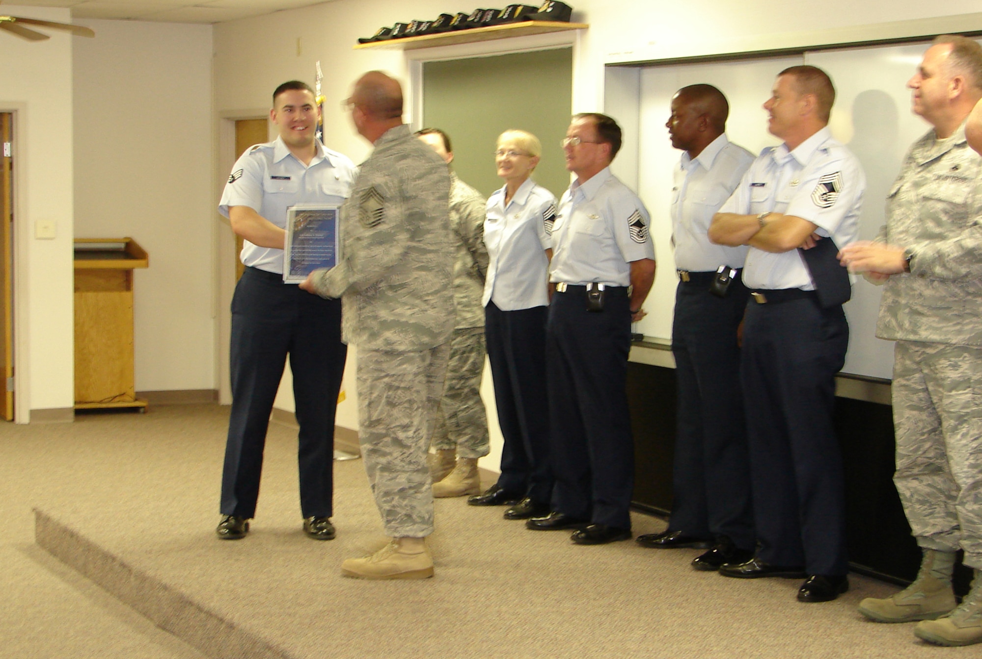Senior Airman Anthony Hayner, 49th Aeromedical Dental squadron recieves the Chief's Choice award, June 22, at Holloman Air Force Base, N.M. The award is given by the Holloman chief's Group to an individual that is identified by a Chief as being a superior Airman. (Courtesy photo)