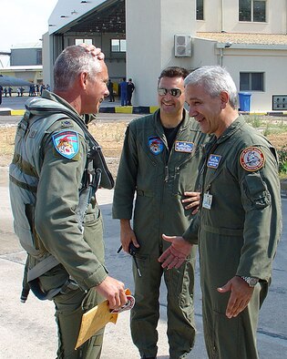 Lt. Col. Doug Read, 115th Fighter Wing Operations Support Flight commander, is greeted by 116th Combat Wing commander, Col. Kostas Vouzios, upon arrival to Araxos Air Force Base, Greece, June 20.  The reunion between the two friends who formerly worked together during Colonel Read's year stationed there 12 years ago, occurred during an F-16 Fighting Falcon delivery by four 115th FW pilots to the Hellenic air force.
(Photo submitted by Mr. Clyde Williams)
