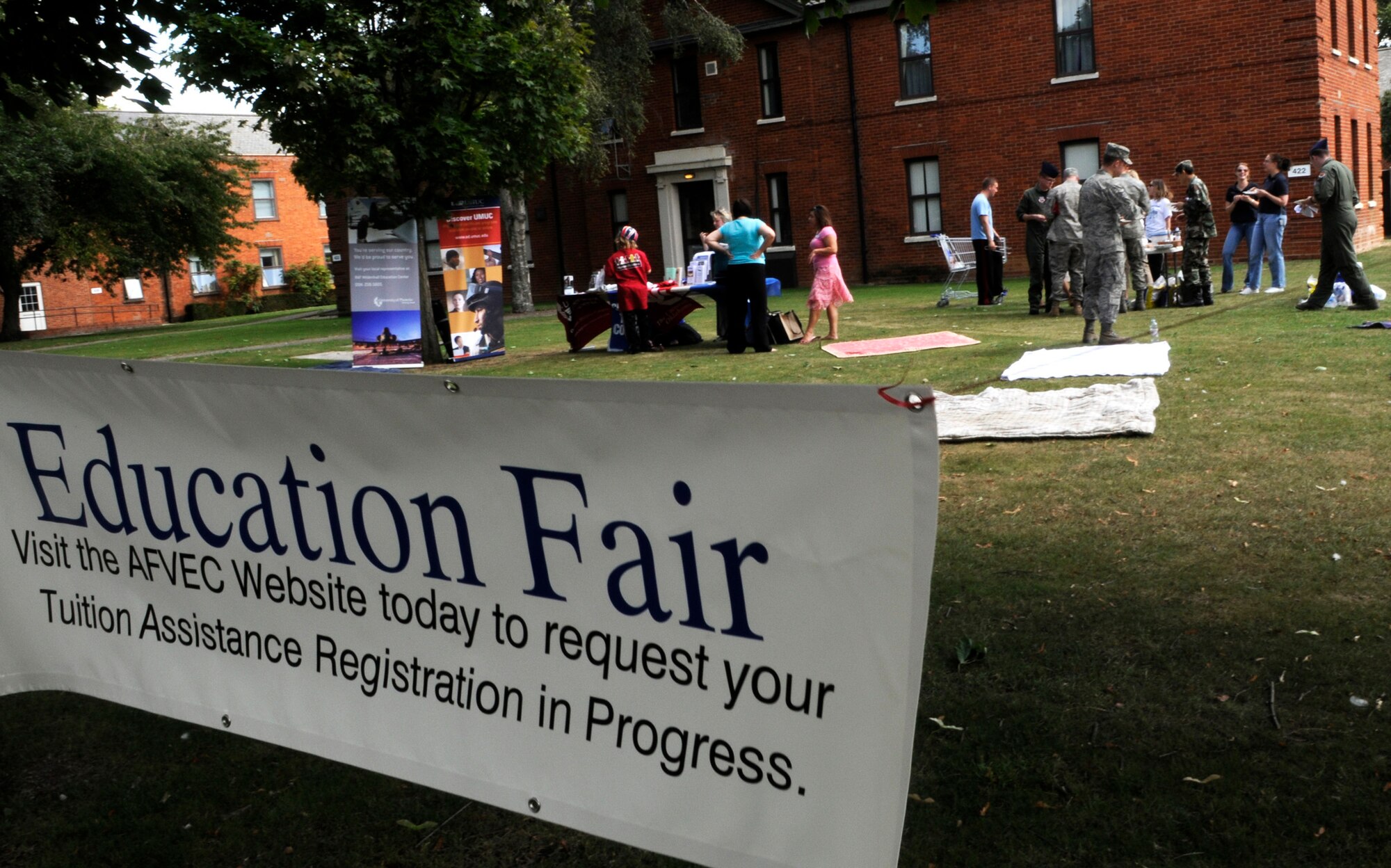 The RAF Mildenhall Education Center here hosted an education fair and barbeque July 16 in the lawn outside Building 422 to promote education opportunities available for the Mildenhall community. For information on grants, financial aid and programs offered at each of the education center?s five schools, call DSN 238-2115. (U.S. Air Force photo by Senior Airman Thomas Trower)