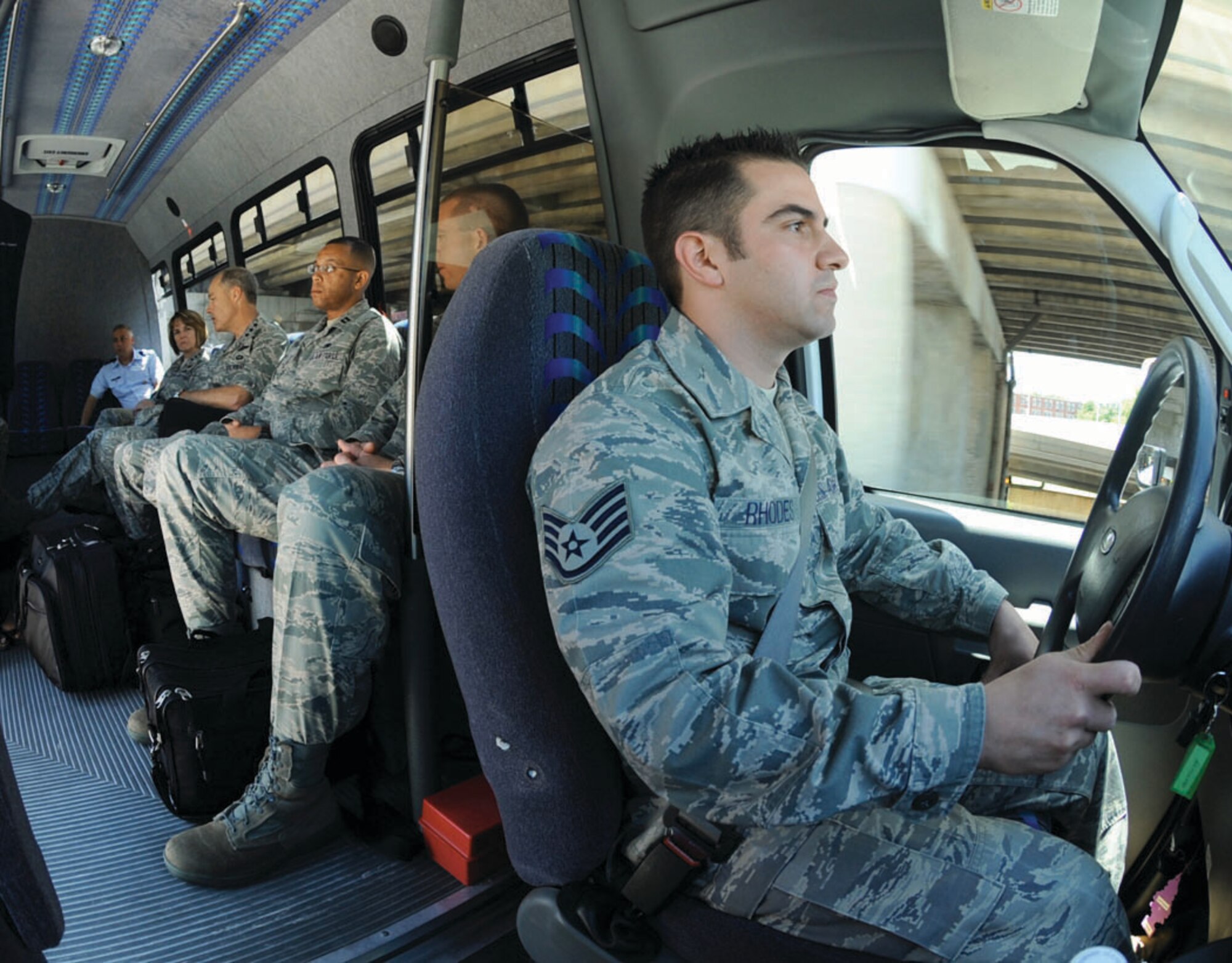 Staff Sgt. David Rhodes, 316 Logistics Readiness Squadron Executive Driving Service, drives a distinguished visitor sulrey from Andrews to the Pentagon on July 14. There are a total of 6 Airmen that are members of the EDS, who are responsible for transporting visiting generals around the National Capital Region. The Airmen who make up the EDS team have been handpicked by leadership and receive special evasive training from the Office of Special Investigations for protecting the lives of distinguished visitors. (U.S. Air Force photo/ Airman 1st Class Melissa Rodrigues)