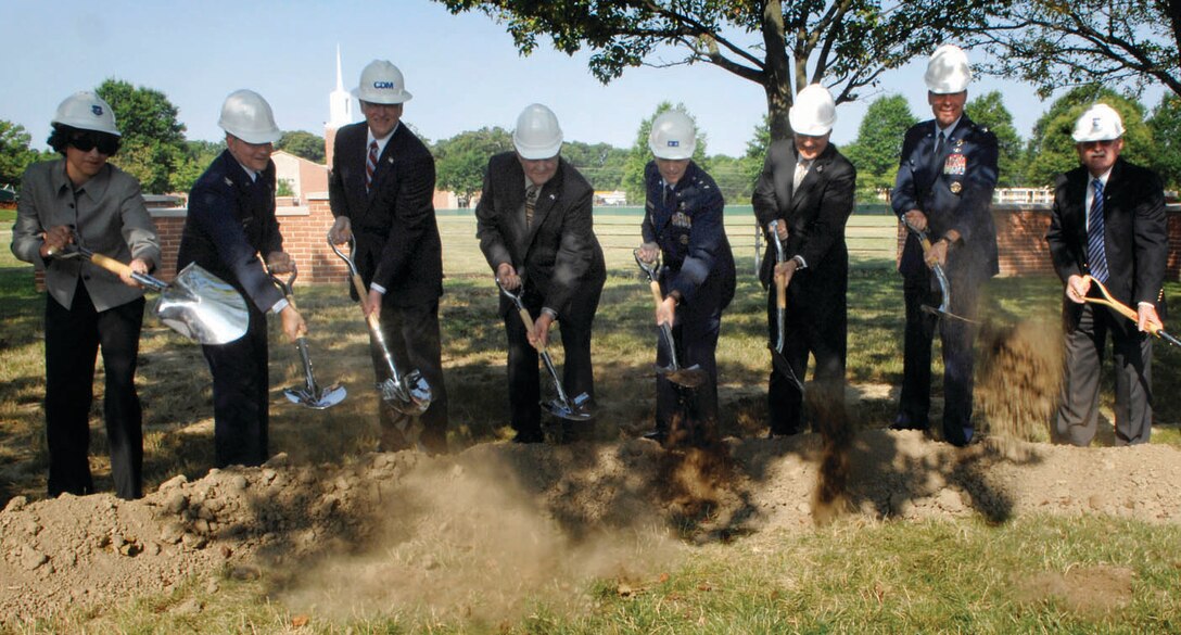 Major General Ralph Jodice, Air Force District of Washington commander, along with Colonel Steven Shepro, 316th Wing/Andrews AFB Commander and other distinguished guests in the design and planning of the new headquarters building, break ground in front of building 1535 on 13 July. The new Air Force District of Washington headquarters building is scheduled to be completed in 2012. (U.S. Air Force photo/ Airman 1st Class Melissa Rodrigues)
