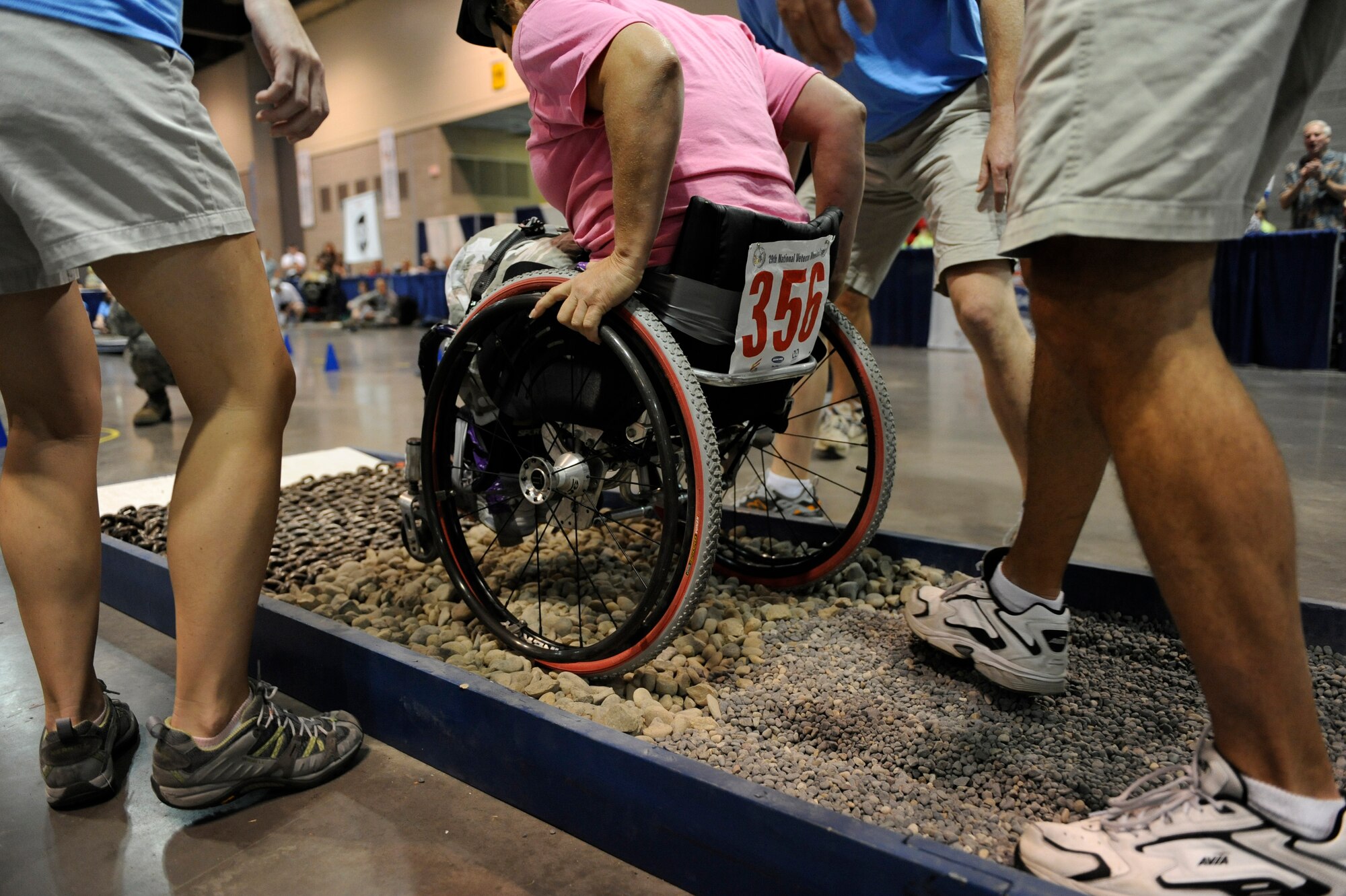 Patricia LaBar goes through rocks and sand as she competes in the slalom super G competition during the 29th National Veterans Wheelchair Games July 16 in Spokane, Wash. Ms. LaBar is an Army veteran and resides in Dallas. (U.S. Air Force photo/Staff Sgt. Desiree N. Palacios)