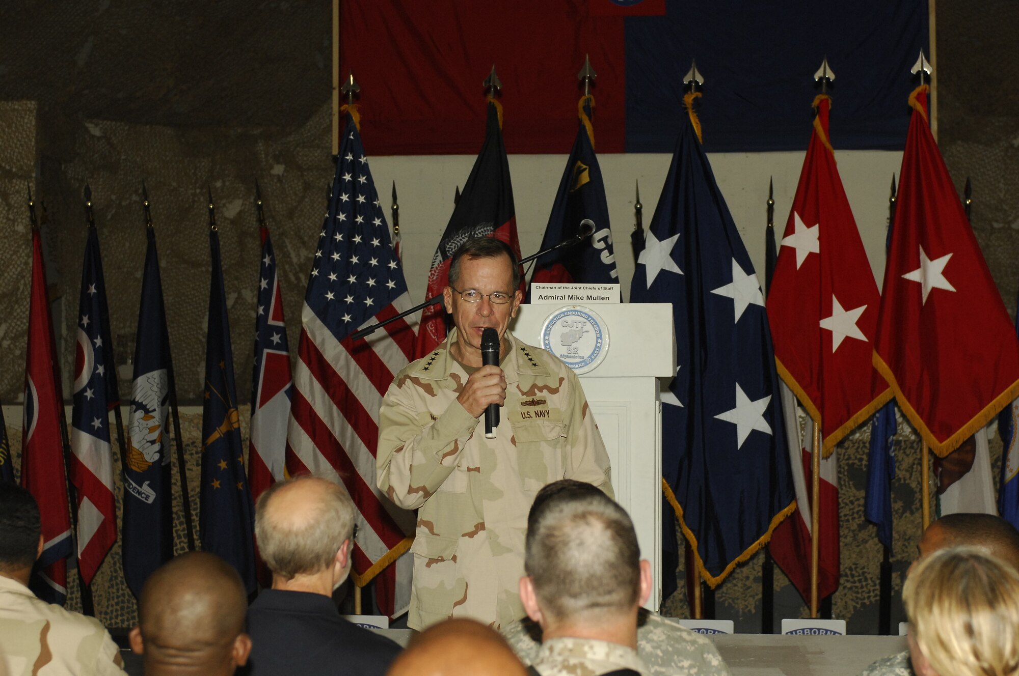 BAGRAM AIRFIELD, Afghanistan -- In a clam-shell tent packed with standing room only crowds, the Chairman of the Joint Chiefs of Staff, Admiral Michael Mullen discussed top issues with about 300 servicemembers here July 14. Before leaving the admiral made it a point to shake every single person's hand and offered a "thank you for what you're doing here in Afghanistan." (U.S. Air Force photo/Tech Sgt. John Jung)

