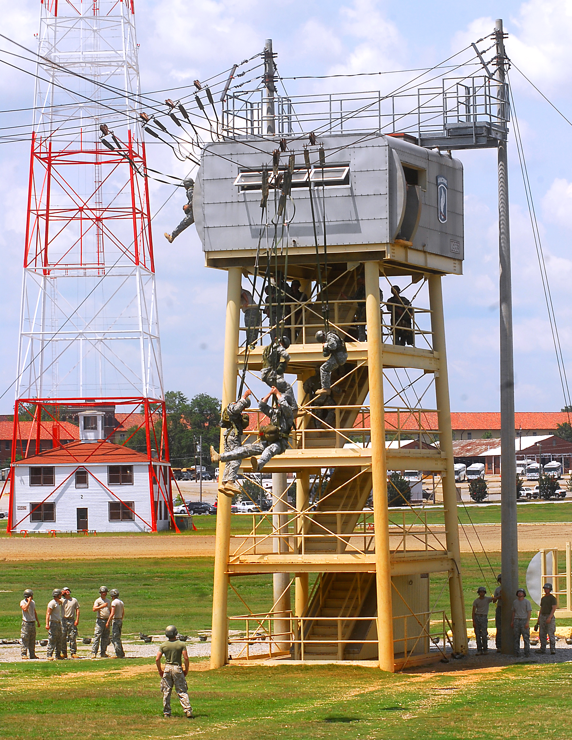 Soldiers take on mastering mass exit jumps from the 34 foot tower