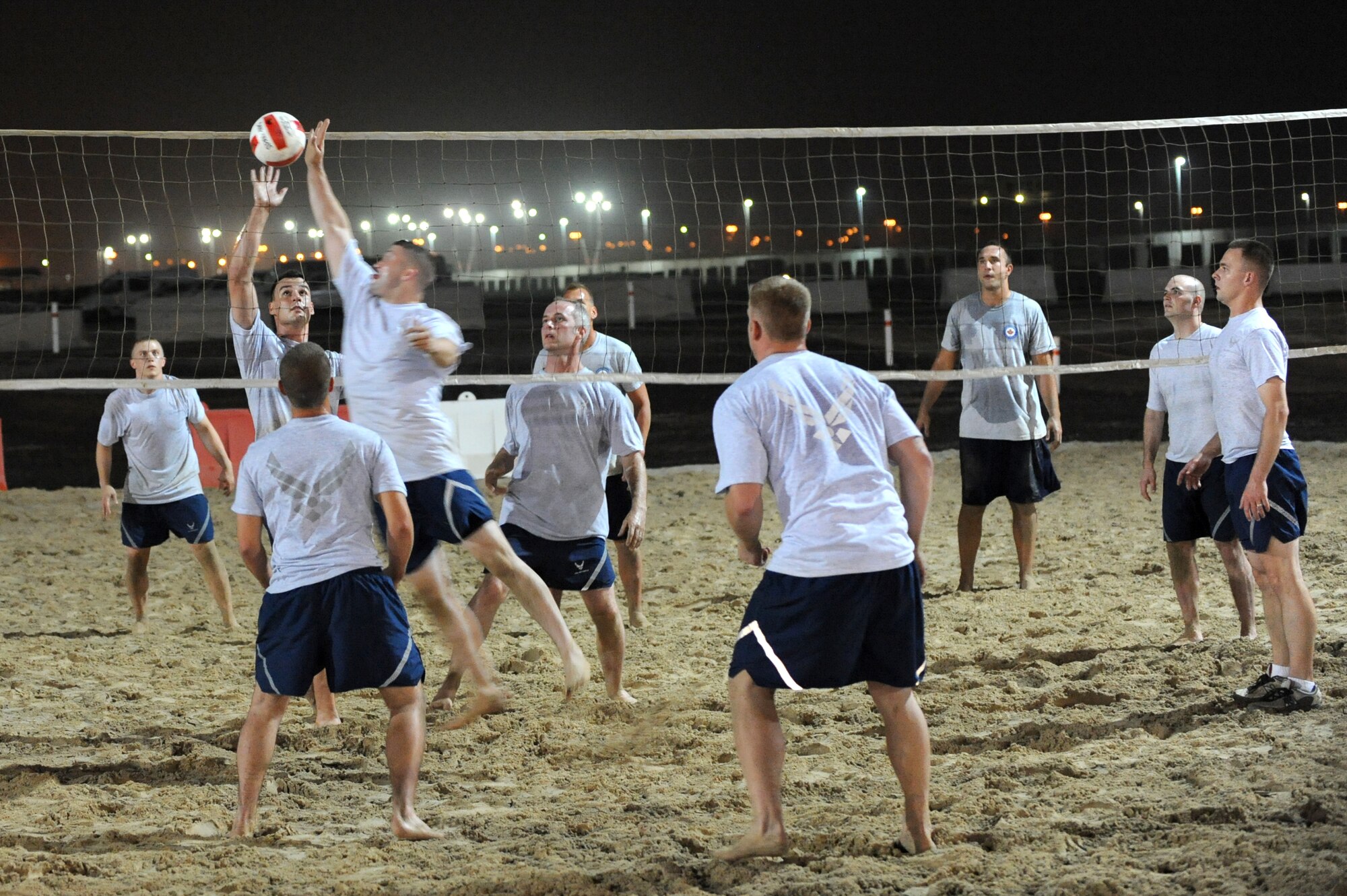 SOUTHWEST ASIA - 380th Expeditionary Civil Engineer Squadron, Fire Dawgs-A team faces the 380th Expeditionary Airborne Air Control Squadron, EAACS-A team for the championship game July 15. The Fire Dawgs-A team won the championship game with a score of 15 to 11 in the final match-up. (U.S. Air Force photo Tech. Sgt. Charles Larkin Sr)