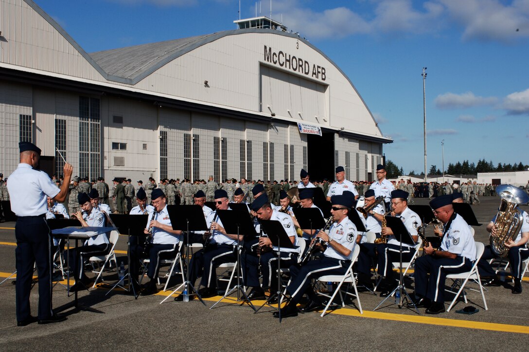 MCCHORD AIR FORCE BASE, Wash. -- Members of the Air Force Band of the Golden West play prior to the opening ceremony for RODEO 2009. RODEO is an international competition that helps our allies and friends around the world improve and find different ways to better employ mobility aircraft. (U.S. Air Force photo/Senior Airman Emerald Ralston)
