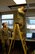 Senior Airmen Uriah Beagle and Kenneth Treadway wire cables in the ceiling in preperation for the Air Mobility RODEO July 19, 2009. RODEO is an international combat skills and flying operations competition designed to develop and improve techniques and procedures with our international partners to enhance mobility operations.  Airmen Beagle and Treadway are assingend to the 62nd Communications Squadron, McChord Air Force Base, Wash. (U.S. Air Force photo/Tech. Sgt. Rease Wold)