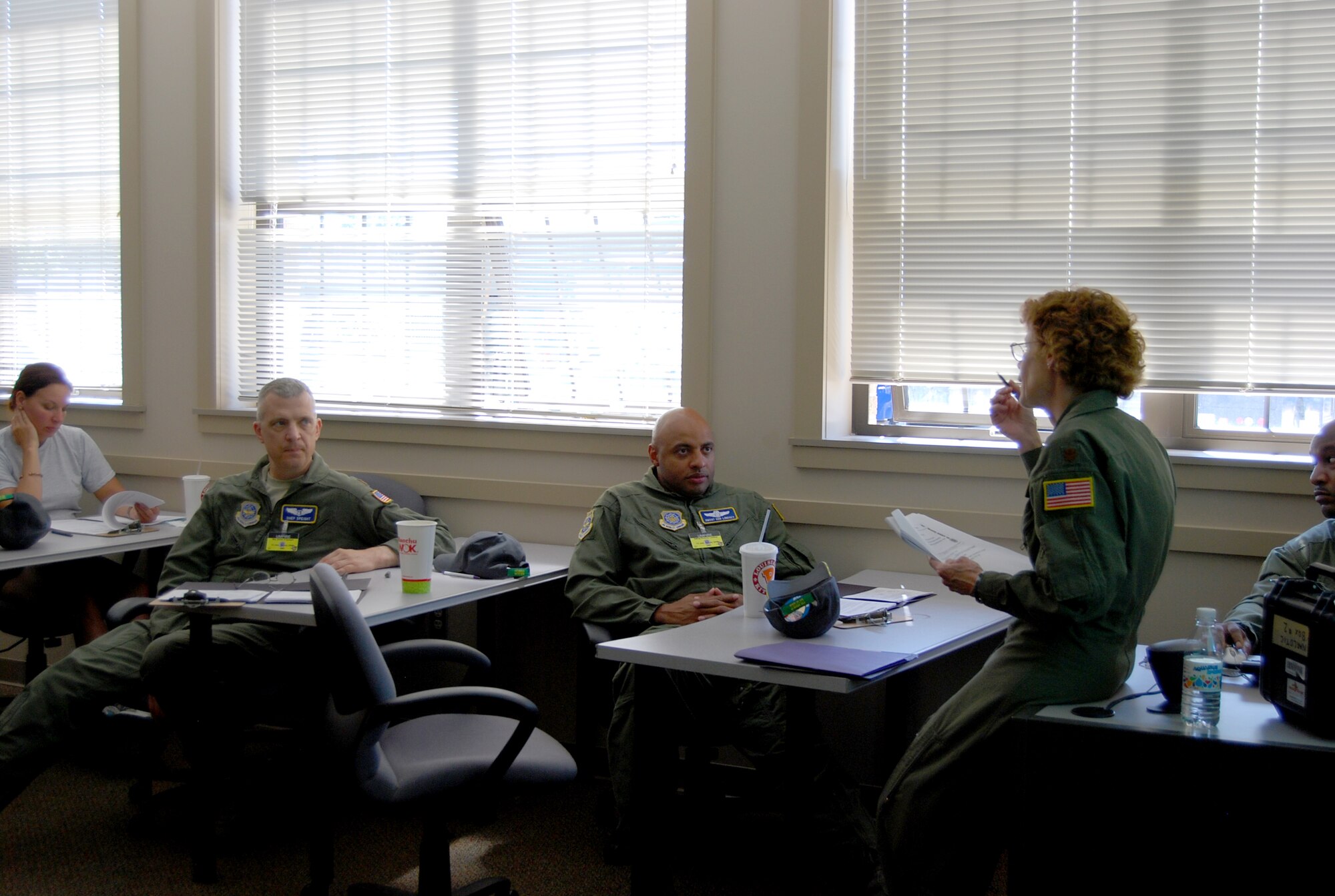 Maj. Melissa Smith, Headquarters Air Mobility Command command flight nurse from Scott Air Force Base, Ill., instructs Air Mobility RODEO 2009 aeromedical evacuation umpires July 19, 2009, of the standards that will be equally applied to every AE team at McChord Air Force Base, Wash. (U.S. Air Force Photo/Airman 1st Class Amber Kelly-Herard)