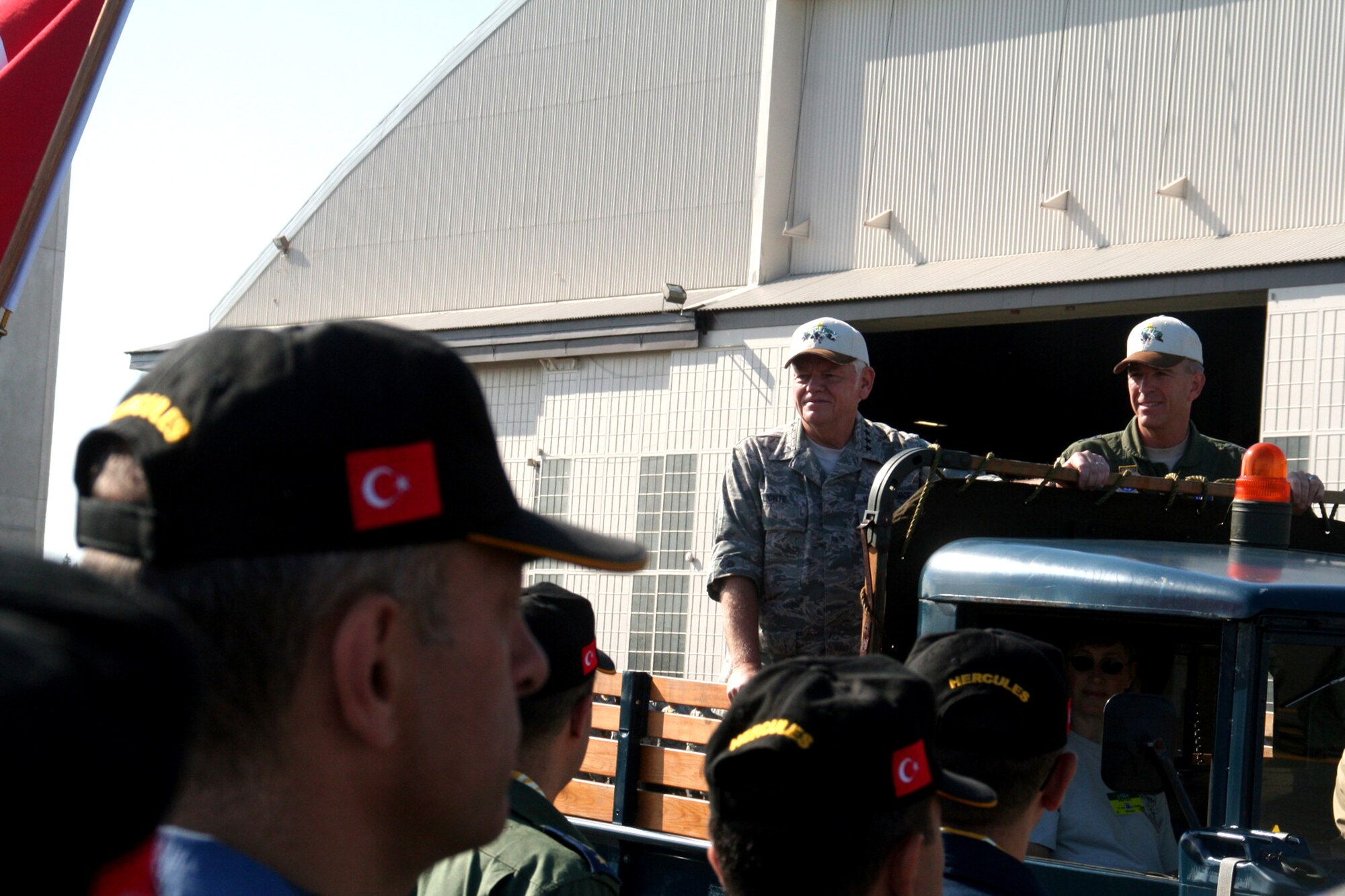 Gen. Arthur Lichte, Air Mobility Command commander, and Maj. Gen. Brooks Bash, RODEO 2009 commander, participate in the "pass and review" portion of the opening ceremonies for Air Mobility Command's RODEO 2009 July 19 at McChord Air Force Base, Wash.  More than 100 teams are participating in RODEO competition, including teams from seven foreign countries. RODEO is the U.S. Air Force's and AMC's premier air mobility competition. It's an international combat skills and flying operations competition designed to develop and improve techniques, procedures and interoperability with international partners to optimize mobility partnerships and enhance mobility operations. (U.S. Air Force Photo/Tech. Sgt. Scott T. Sturkol)
