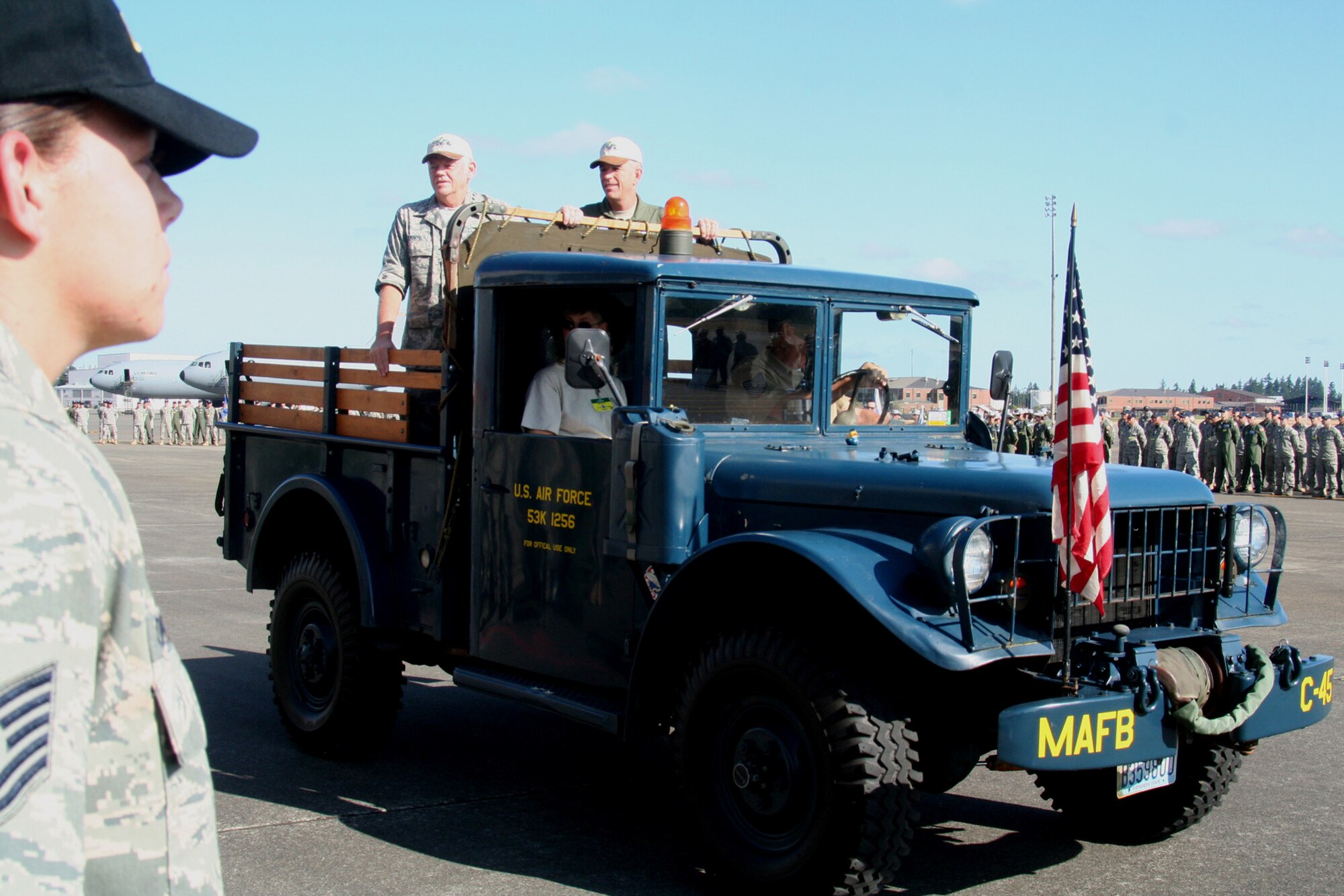 Gen. Arthur Lichte, Air Mobility Command commander, and Maj. Gen. Brooks Bash, RODEO 2009 commander, participate in the "pass and review" portion of the opening ceremonies for Air Mobility Command's RODEO 2009 July 19 at McChord Air Force Base, Wash.  More than 100 teams are participating in RODEO competition, including teams from seven foreign countries. RODEO is the U.S. Air Force's and AMC's premier air mobility competition. It's an international combat skills and flying operations competition designed to develop and improve techniques, procedures and interoperability with international partners to optimize mobility partnerships and enhance mobility operations. (U.S. Air Force Photo/Tech. Sgt. Scott T. Sturkol)