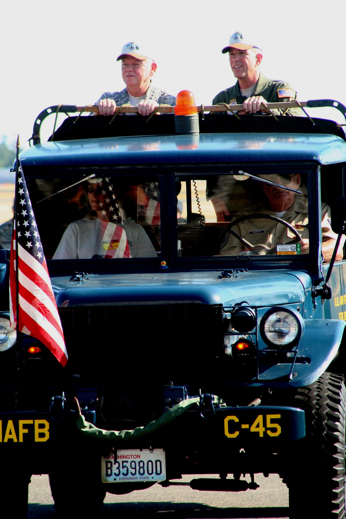 Gen. Arthur Lichte, Air Mobility Command commander, and Maj. Gen. Brooks Bash, RODEO 2009 commander, participate in the "pass and review" portion of the opening ceremonies for Air Mobility Command's RODEO 2009 July 19 at McChord Air Force Base, Wash.  More than 100 teams are participating in RODEO competition, including teams from seven foreign countries. RODEO is the U.S. Air Force's and AMC's premier air mobility competition. It's an international combat skills and flying operations competition designed to develop and improve techniques, procedures and interoperability with international partners to optimize mobility partnerships and enhance mobility operations. (U.S. Air Force Photo/Tech. Sgt. Scott T. Sturkol)