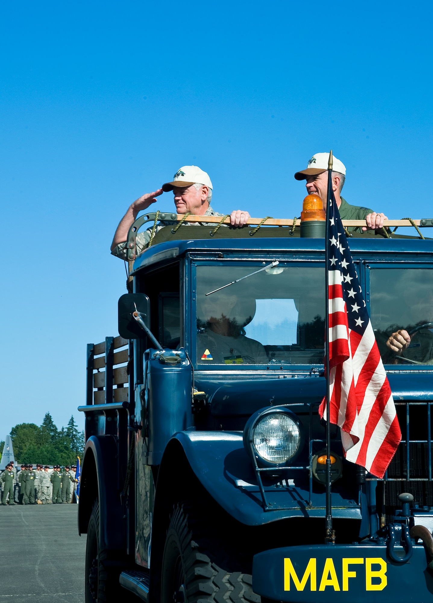 Gen. Arthur J. Lichte salutes all participating countries and teams of the Air Mobility Rodeo 2009 while conducting a pass and review during opening ceremony July 19 at McChord Air Force Base, Wash. General Lichte is the commander of the Air Mobility Command from Scott AFB, Ill. (U.S. Air Force photo/Staff Sgt. Bennie J. Davis III)