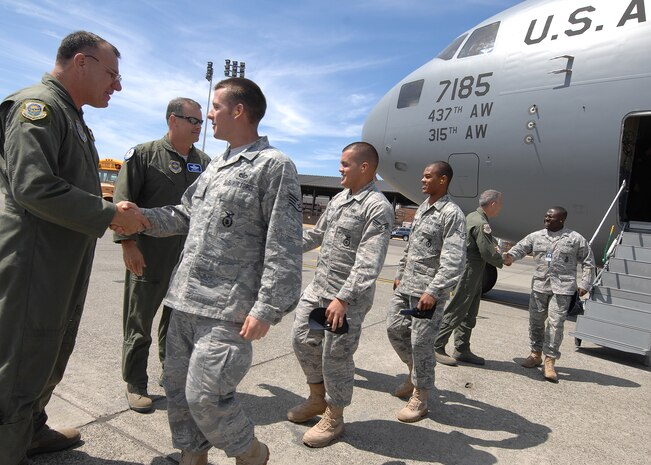 Members of the 437th Airlift Wing are greeted upon arrival for Air Mobility RODEO 2009 at McChord Air Force Base, Wash., July 18.  RODEO is an international combat skills and flying operations competition designed to develop and improve techniques and procedures with our international partners to enhance mobility operations. (U.S Air Force photo/Senior Airman Dayton Mitchell)
