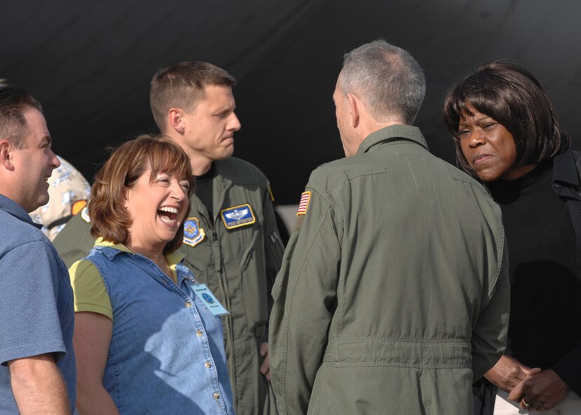 Maj. Gen. Brooks Bash greets Dilenna Harris upon arrival at McChord Air Force Base, Wash., during Air Mobility RODEO 2009, July 18.  RODEO is an international combat skills and flying operations competition designed to develop and improve techniques and procedures with our international partners to enhance mobility operations. General Bash is the RODEO commander, and Ms. Harris is a civic leader from Travis AFB, Calif. (U.S Air Force photo/Senior Airman Dayton Mitchell)