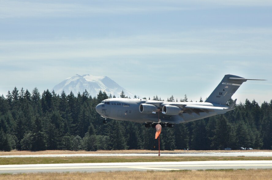A C-17 Globemaster III lands during Air Mobility RODEO 2009 at McChord Air Force Base, Wash., July 18. RODEO is an international combat skills and combat operations competition designed to develop and improve techniques and procedures with our international partners to enhance mobility operations.  The C-17 and its crew are assigned to the 3rd Airlift Wing, Elmendorf AFB, Alaska (U.S. Air Force photo/Senior Airman Matthew Cook)