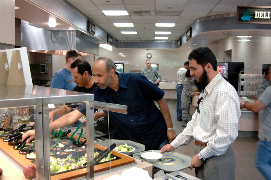 Saudi Arabian military members visit the Olympic Dining Facility at McChord Air Force Base, Wash., during Air Mobility RODEO 2009, July 19. RODEO is an international combat skills and combat operations competition designed to develop and improve techniques and procedures with our international partners to enhance mobility operations. (U.S. Air Force photo/Senior Airman Matthew Cook)