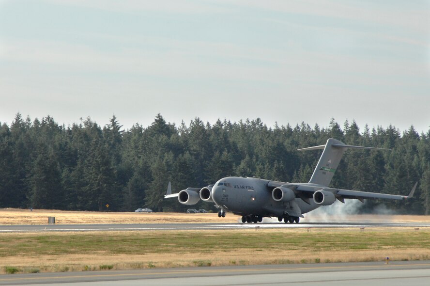 A C-17 Globemaster III lands at McChord Air Force Base, Wash., during Air Mobility RODEO 2009, July 18. RODEO is an international combat skills and combat operations competition designed to develop and improve techniques and procedures with our international partners to enhance mobility operations. (U.S. Air Force photo/Senior Airman Matthew Cook)