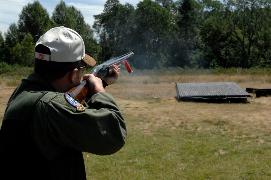 1st Lt. Britt Stallings shoots at a clay pigeon during the Sportsman Club "fun shoot", part of Air Mobility RODEO 2009 events held at McChord Air Force Base, Wash., July 17.  RODEO is an international combat skills and flying operations competition designed to develop and improve techniques and procedures with our international partners to enhance mobility operations. Lieutenant Stallings is from the 349th Air Refueling Squadron, McConnell Air Force Base, Kan. (U.S. Air Force photo/Senior Airman Matthew Smith)