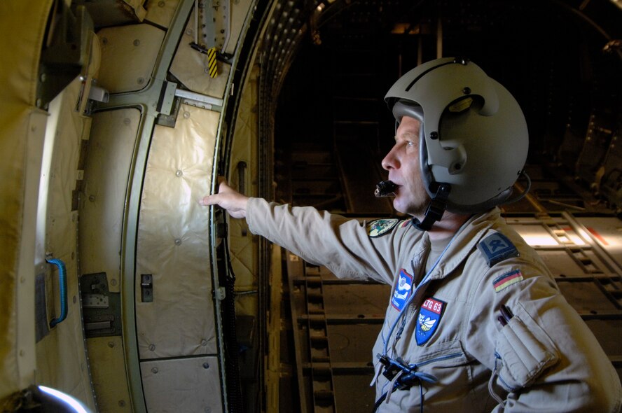 German Air Force Master Sgt. Kai Hanno, loadmaster on a C-160, scans the flightline before takeoff during Air Mobility RODEO 2009 at McChord Air Force Base, Wash., July 19.RODEO is an international combat skills and combat operations competition designed to develop and improve techniques and procedures with our international partners to enhance mobility operations. (U.S. Air Force photo/Senior Airman Matthew Cook)