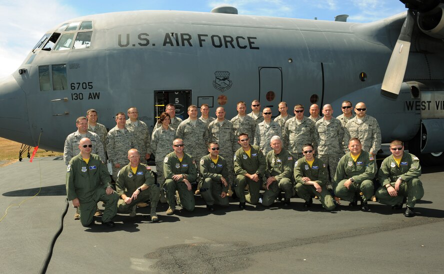Members from the 130th Airlift Wing, from Charleston, W.Va., gather for a photo at McChord Air Force Base, Wash., as part of Air Mobility RODEO 2009, July 18. RODEO is an international combat skills and flying operations competition designed to develop and improve techniques and procedures with our international partners to enhance mobility operations. (U.S. Air Force photo by Tech. Sgt. Michelle Larche)