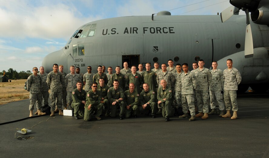 Members from the 374th Airlift Wing, Yokota Air Base, Japan, gather for a photo at McChord Air Force Base, Wash., as part of Air Mobility RODEO 2009, July 18. RODEO is an international combat skills and flying operations competition designed to develop and improve techniques and procedures with our international partners to enhance mobility operations. (U.S. Air Force photo by Tech. Sgt. Michelle Larche)