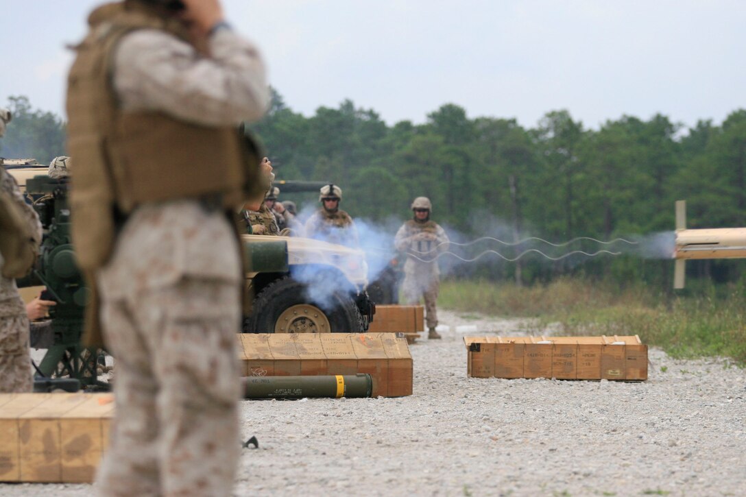 Marines from Weapons Company, 2nd Battalion, 2nd Marine Regiment, 2nd Marine Division, fire a Tube-launched Optically-tracked Wire-guided missile out of a M41 Saber Improved Target Acquisition System during training aboard Camp Lejeune, N.C., July 19, 2009. The battalion fired 20 missiles as part of an exercise to familiarize the Marines with the new ITAS weapon system.