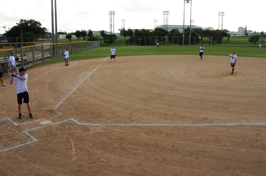 Chief Master Sgt. Michael Warner, 18th Wing command chief, waits patiently for the perfect pitch at the Dorm Softball Tournament at Kadena Air Base July 18. The First Sergeants Assocation, which sponsored the event, plans to hold the tournament annually. (U.S. Air Force photo/Airman 1st Class Amanda Grabiec)