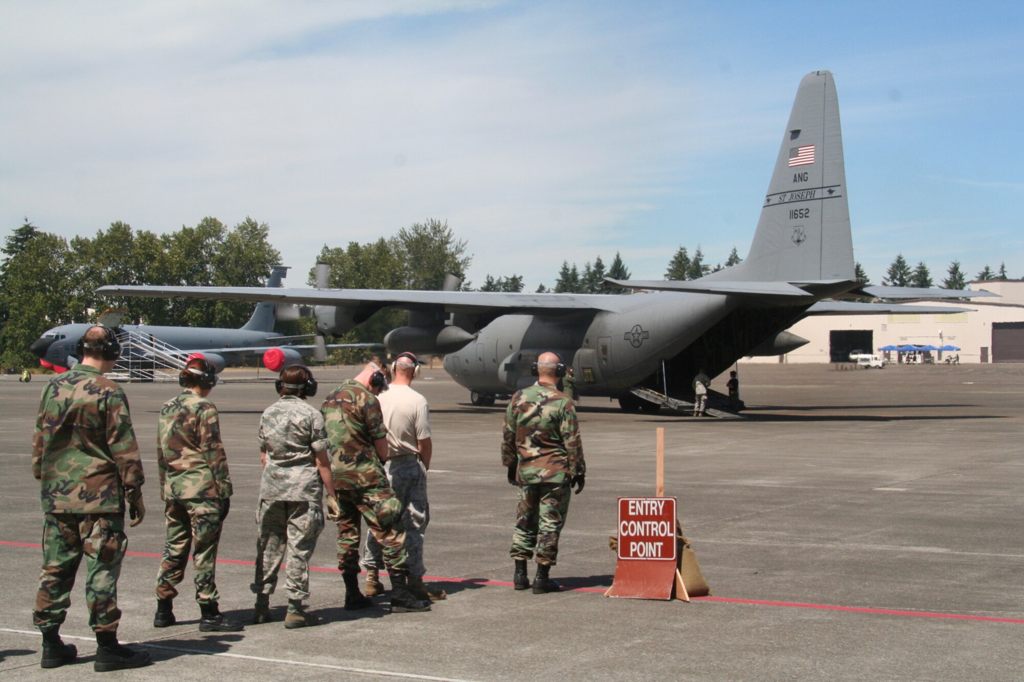Teams competing in the aeromedical evacuation events for Air Mobility RODEO 2009 wait in line as the competition commences at McChord Air Force Base, Wash., July 20, 2009.  More than 100 teams are participating in RODEO competition, including teams from seven foreign countries. RODEO is the U.S. Air Force's and AMC's premier air mobility competition. It's an international combat skills and flying operations competition designed to develop and improve techniques, procedures and interoperability with international partners to optimize mobility partnerships and enhance mobility operations. (U.S. Air Force Photo/Tech. Sgt. Scott T. Sturkol)