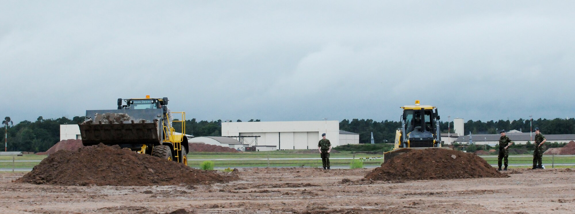 Royal Air Force air cadets operate heavy equipment during a July 14 visit to Ramstein Air Base, Germany. RAF cadets visited Ramstein AB for a week of leadership development and contingency skills training. (U.S. Air Force photo/Senior Airman Nathan Lipscomb) 
