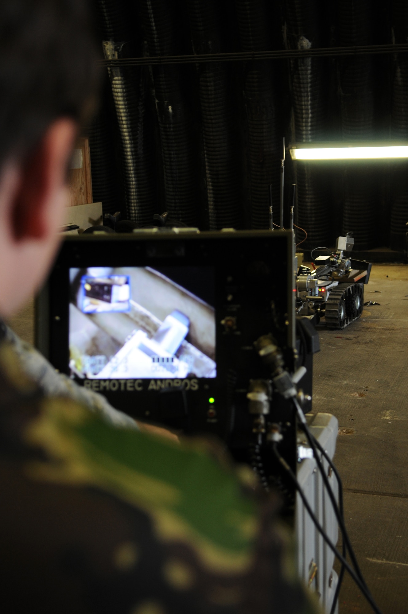 British Air Cadet Cpl. Ian Callow operates an explosive ordnance disposal talon robot during the cadet's July 14 visit to Ramstein Air Base, Germany. Cadets visited Ramstein AB for a week of leadership development and contingency skills training. (U.S. Air Force photo/Airman 1st Class Caleb Pierce)
