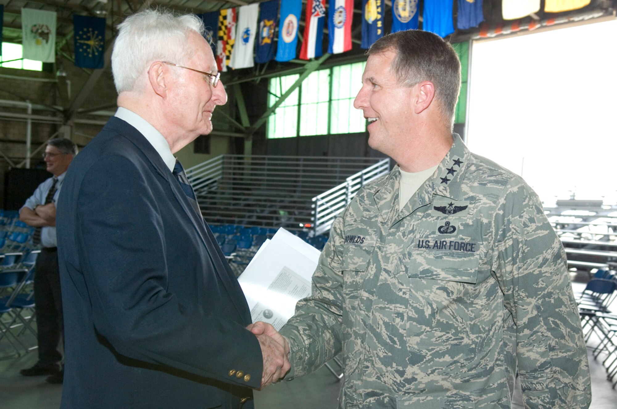 HANSCOM AIR FORCE BASE, Mass. –Lt. Gen. Ted Bowlds, Electronic Systems Center commander, speaks with Morley Piper, a World War II veteran who spoke about his D-Day experiences at the Heritage of Freedom event that followed General Bowlds commander’s call on July 16 at the Aero Club. (U.S. Air Force photo by Mark Herlihy)