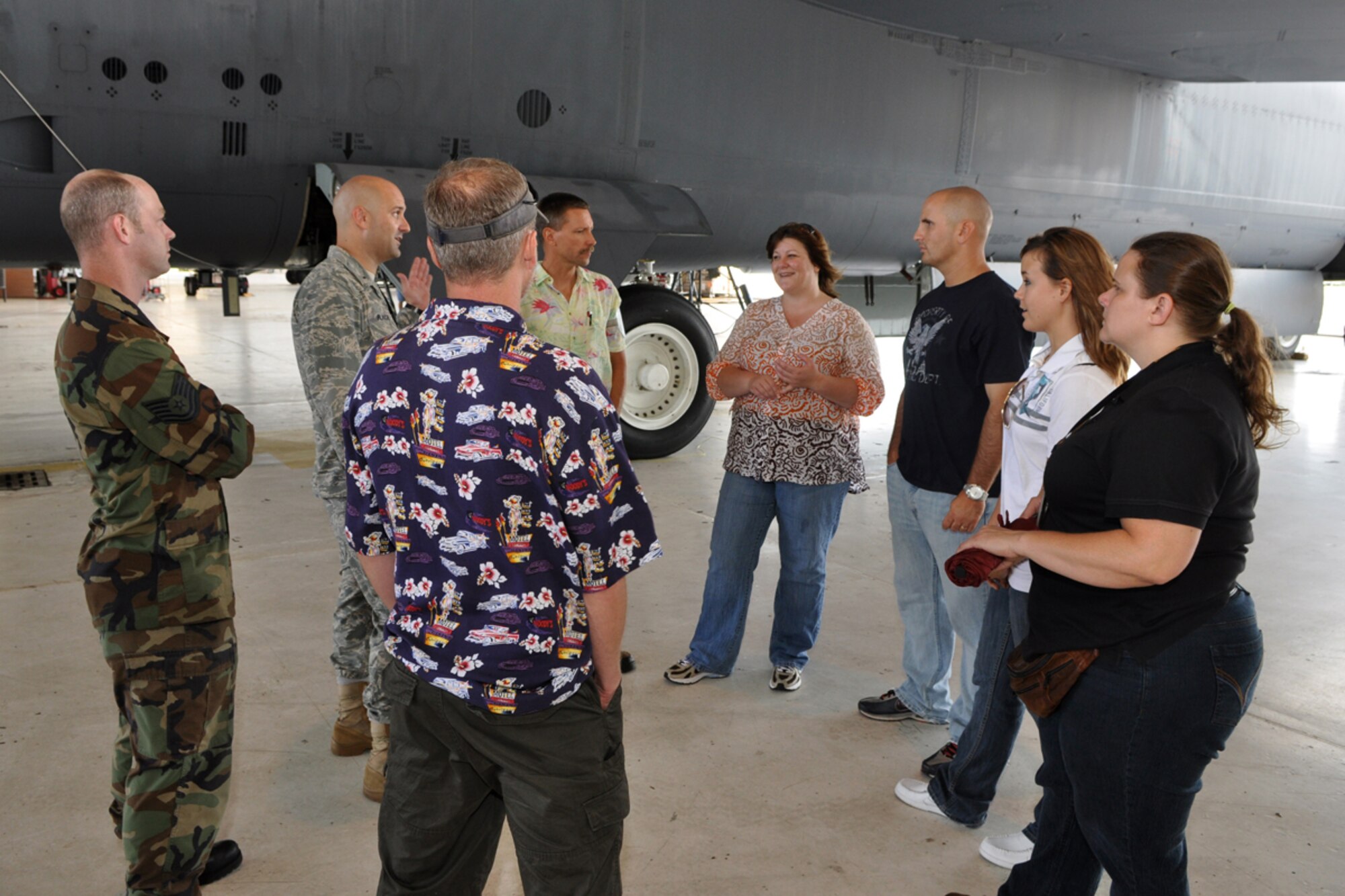 Manager interns for Logistics Palace Acquire at Tinker Air Force Base, Okla., receive a briefing from 1st Lt. Brian Plauche, 917th Maintenance Squadron, maintenance officer, during a tour at Hangar One of 93rd Bomb Squadron on Barksdale Air Force Base, La., July 17, 2009. The interns are part of a three-year program, which focuses on developing high-potential enthusiastic logistic professionals. Pictured from left to right is Technical Sgt. Brandy Bills, 11th Bomb Squadron, crew chief, Lieutenant Plauche, Technical Sgt. Rob Turcotte, 917th Maintenance Squadron, crew chief, Master Sgt. Bob Slansky, 917th Maintenance Squadron, crew chief, Carrie Burton, program manager, Marc Williams, item manager, Kayce Godwin, industrial management specialist and Kelli Muntz, industrial management specialist. 