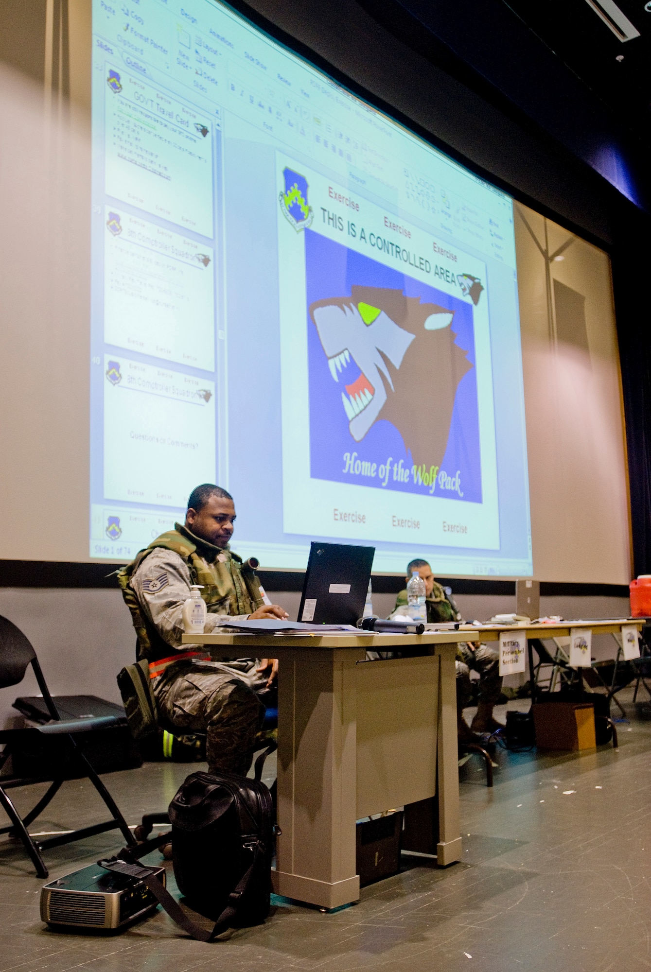KUNSAN AIR BASE, Republic of Korea -- Staff Sgt. Terence Walker updates an "Accepting Follow On Forces" briefing July 20, 2009. Sergeant Walker is from the 8th Force Support Squadron. He informs follow on forces on what amenities are available to them when they arrive. Airman Walker is participating in a peninsula-wide exercise that tests Kunsan's ability to defend the base, accept follow-on forces and take the fight north. (U.S. Air Force photo by Senior Airman Jonathan Steffen) 