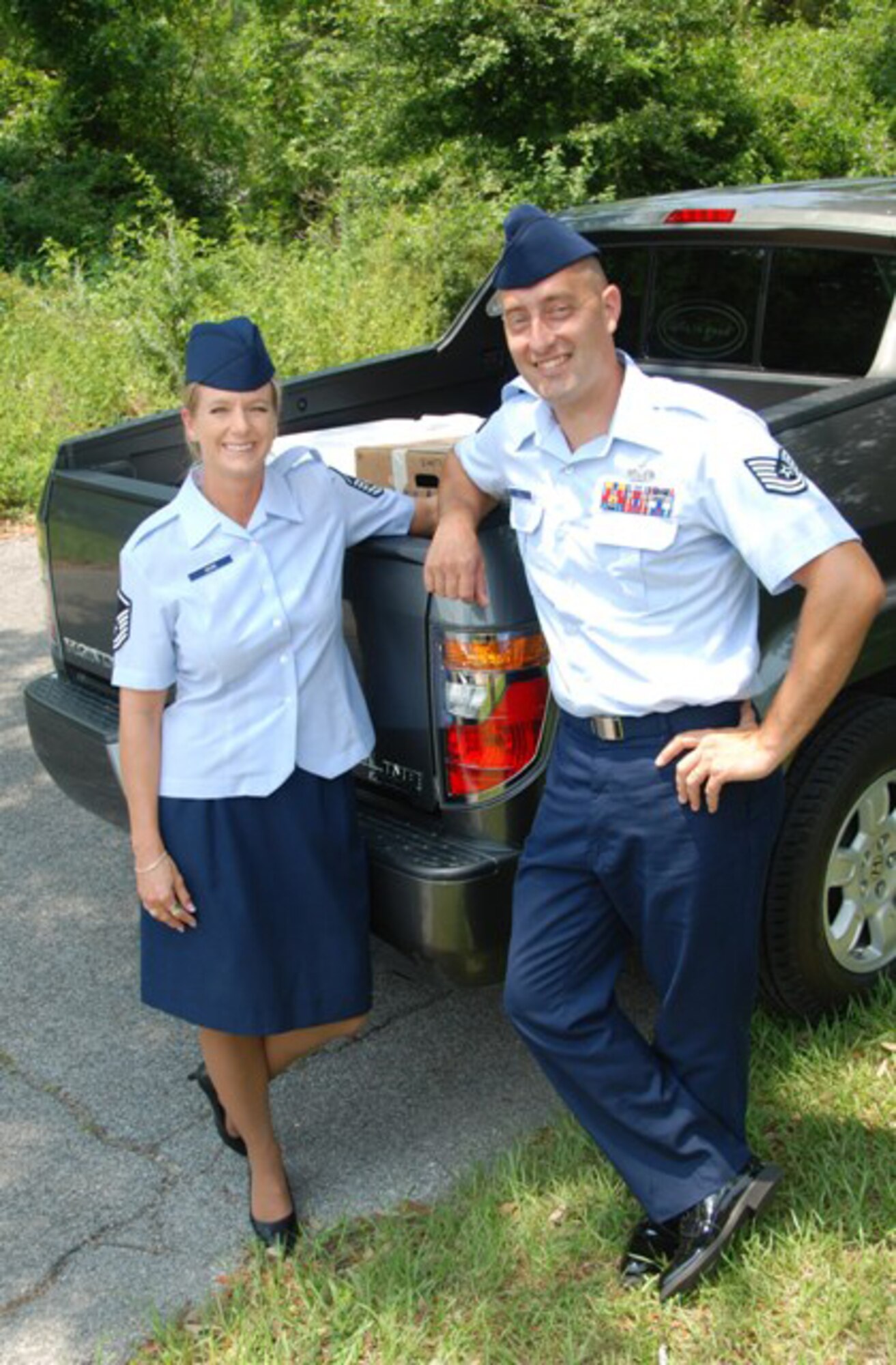 Master Sgt. Wendy Gehri and Tech. Sgt. Joe Ezell, members of America's AOC, on their delivery route for the Bay County Council on Aging Meals on Wheels program. (US Air Force Photo by: 1st Lt. Jared Scott)