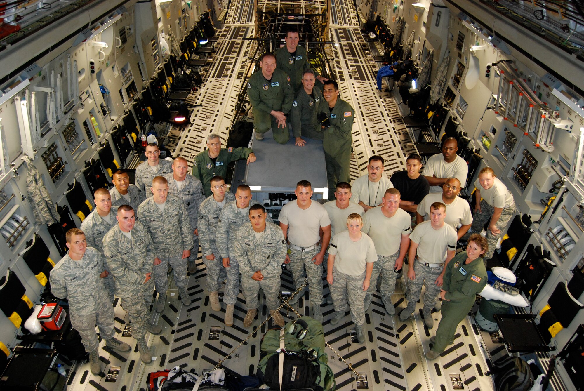 Airmen from the 512th and 436th Airlift Wings, Dover Air Force Base, Del., arrived July 18 for the Air Mobility Command RODEO at McChord AFB, Wash. Team Dover will be tested on many airlift operation aspects including aerial port, maintenance, security forces and aircrew events. (U.S. Air Force photo/Staff Sgt. Steve Lewis)