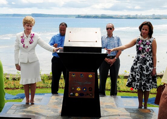ANDERSEN AIR FORCE BASE, Guam - (From Left to right) Madeleine Bordallo, Congressional Delegate of Guam; Joey Crisostomo, Armed Forces Committee chairman; Jim Adkins, vice-civilian co-chair of the Andersen Advisory Council Executive Committee; and First Lady Joann Camacho stand around the Raider 21 memorial at the Governor's Complex at Adelup Point in Hagatna, Guam, July 20. The memorial was erected at the Governor's complex so everyone both military and civilian can remember those who lost their lives in the Raider 21 crash. (U.S. Air Force photo/Senior Airman Nichelle Anderson) 
