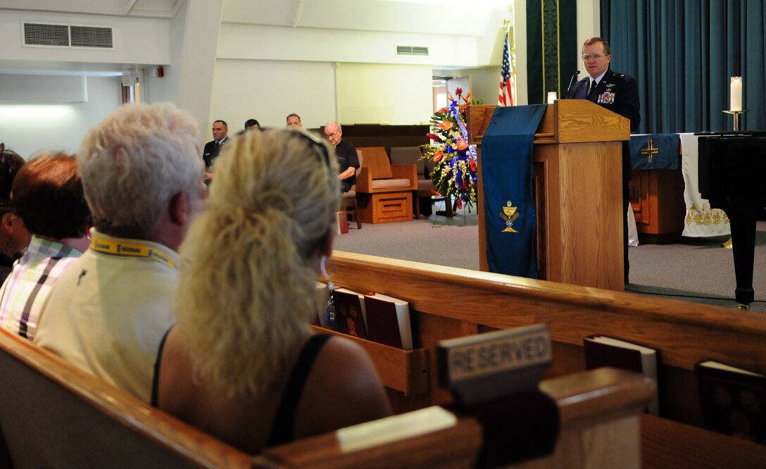 ANDERSEN AIR FORCE BASE, Guam - Brig. Gen. Phil Ruhlman, 36th Wing commander, offers his condolences during a memorial service at Andersen’s Chapel 1 in honor of the Raider 21 aircrew July 19. The memorial service was held in remembrance of Raider 21, a B-52 Stratofortress aircrew that died on Liberation Day July 21, 2008, when their aircraft crashed. (U.S. Air Force photo by Airman 1st Class Courtney Witt)


