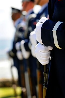 ANDERSEN AIR FORCE BASE, Guam – Airmen from the 36th Wing Honor Guard conduct a 21-gun salute during the Raider 21 memorial unveiling ceremony at the Governor's Complex at Adelup Point in Hagatna, Guam, July 20. Family, friends and co-workers of Raider 21 aircrew along with Team Andersen and Guam community members honored the fallen aircrew with a ceremony where a memorial dedicated to the Airmen was unveiled. Their aircrew died when their B-52 crashed July 21, 2008. (U.S. Air Force photo/Airman 1st Class Courtney Witt) 