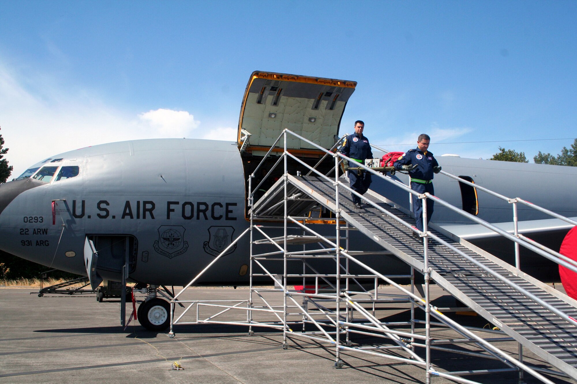 Turkish team members carry a gurney down the Patient Loading System ramp during aeromedical evacuation events for Air Mobility RODEO 2009 at McChord Air Force Base, Wash., July 20, 2009. More than 100 teams are participating in RODEO competition, including teams from seven foreign countries. RODEO is the U.S. Air Force's and AMC's premier air mobility competition. It's an international combat skills and flying operations competition designed to develop and improve techniques, procedures and interoperability with international partners to optimize mobility partnerships and enhance mobility operations. (U.S. Air Force Photo/Tech. Sgt. Scott T. Sturkol)