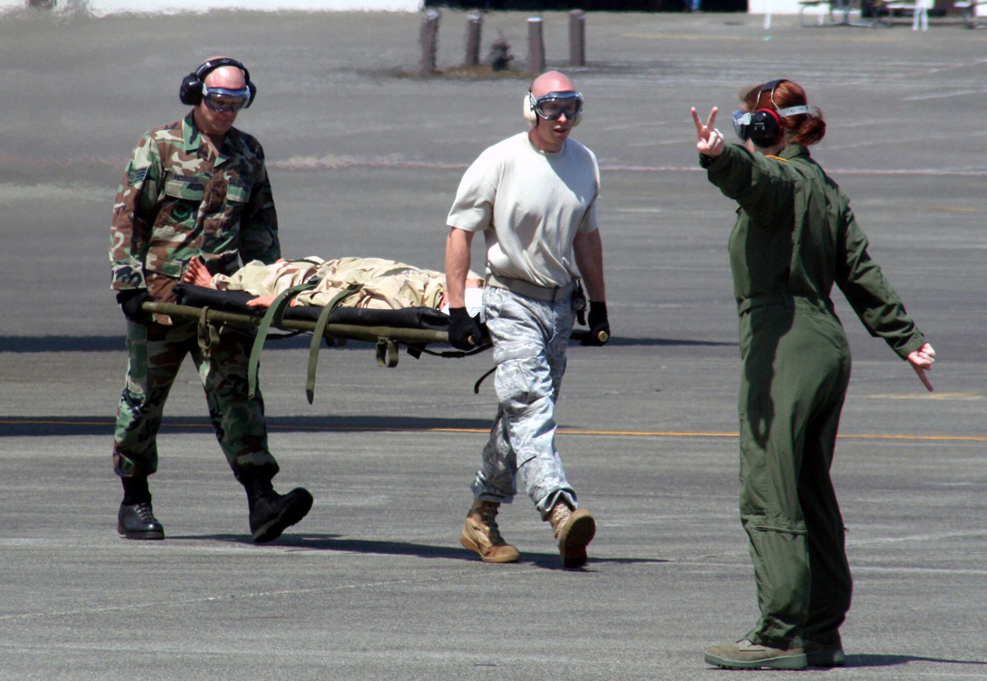 Teams compete in the aeromedical evacuation events for Air Mobility RODEO 2009 at McChord Air Force Base, Wash., July 20, 2009. More than 100 teams are participating in RODEO competition, including teams from seven foreign countries. RODEO is the U.S. Air Force's and AMC's premier air mobility competition. It's an international combat skills and flying operations competition designed to develop and improve techniques, procedures and interoperability with international partners to optimize mobility partnerships and enhance mobility operations. (U.S. Air Force Photo/Tech. Sgt. Scott T. Sturkol)