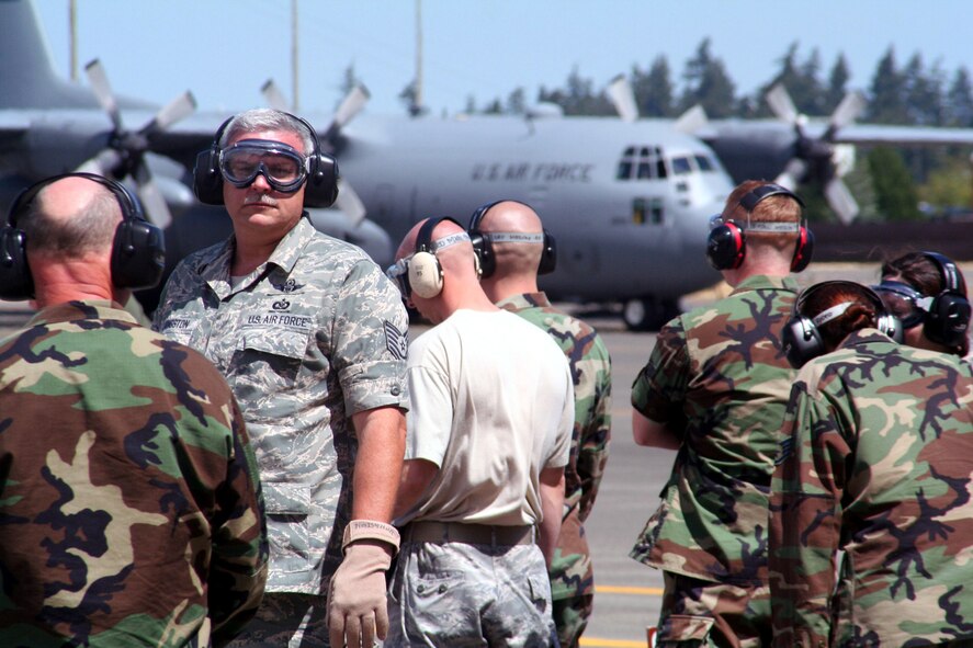 Teams compete in the aeromedical evacuation events for Air Mobility RODEO 2009 at McChord Air Force Base, Wash., July 20, 2009. More than 100 teams are participating in RODEO competition, including teams from seven foreign countries. RODEO is the U.S. Air Force's and AMC's premier air mobility competition. It's an international combat skills and flying operations competition designed to develop and improve techniques, procedures and interoperability with international partners to optimize mobility partnerships and enhance mobility operations. (U.S. Air Force Photo/Tech. Sgt. Scott T. Sturkol)