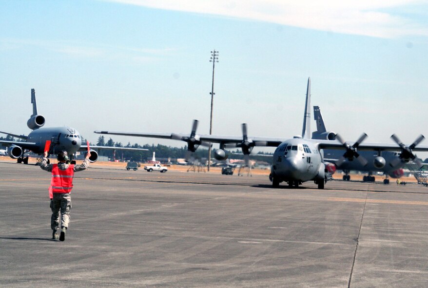 Teams competing in the aeromedical evacuation events for Air Mobility RODEO 2009 wait in line as the competition commences at McChord Air Force Base, Wash., July 20, 2009. More than 100 teams are participating in RODEO competition, including teams from seven foreign countries. RODEO is the U.S. Air Force's and AMC's premier air mobility competition. It's an international combat skills and flying operations competition designed to develop and improve techniques, procedures and interoperability with international partners to optimize mobility partnerships and enhance mobility operations. (U.S. Air Force Photo/Tech. Sgt. Scott T. Sturkol)