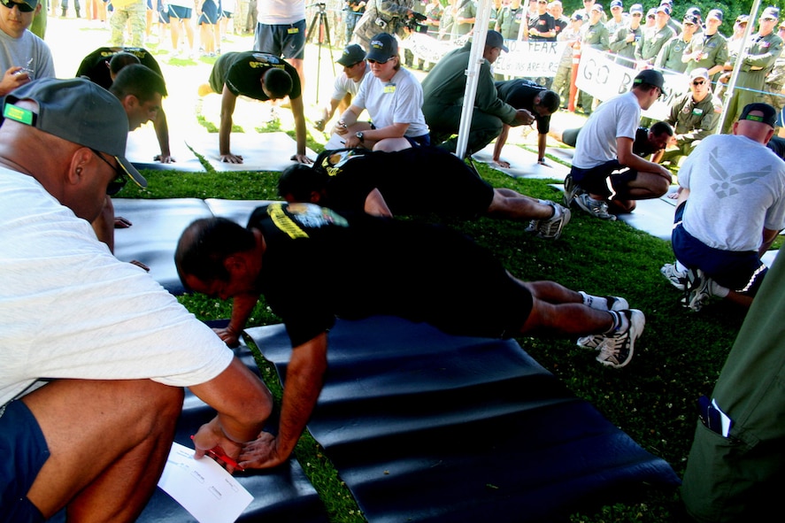 Teams participate in the fit-to-fight competition for Air Mobility Command's RODEO 2009 July 19 at McChord Air Force Base, Wash.  More than 100 teams are participating in RODEO competition, including teams from seven foreign countries. RODEO is the U.S. Air Force's and AMC's premier air mobility competition. It's an international combat skills and flying operations competition designed to develop and improve techniques, procedures and interoperability with international partners to optimize mobility partnerships and enhance mobility operations. (U.S. Air Force Photo/Tech. Sgt. Scott T. Sturkol)
