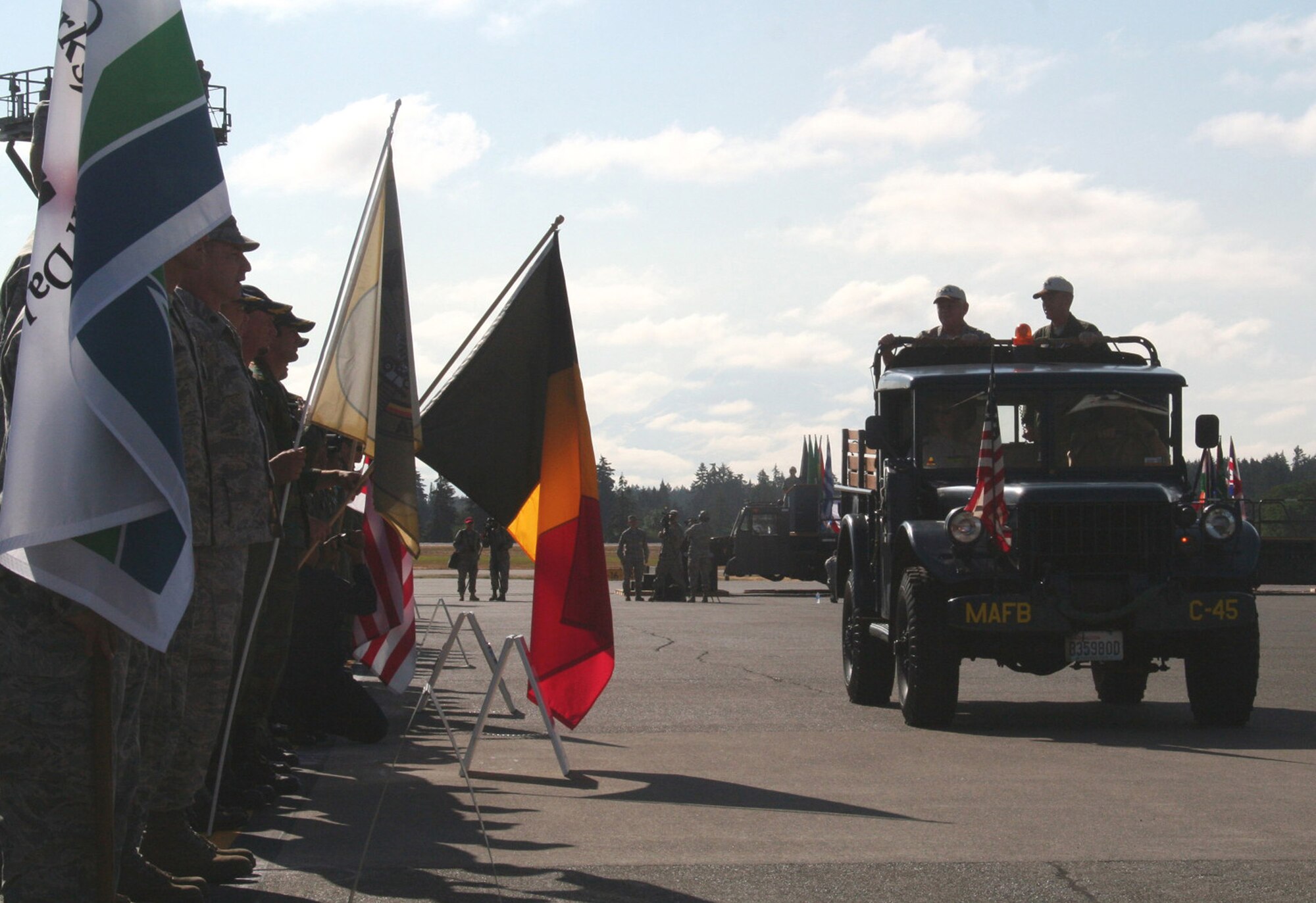 Gen. Arthur Lichte, Air Mobility Command commander, and Maj. Gen. Brooks Bash, RODEO 2009 commander, participate in the "pass and review" portion of the opening ceremonies for Air Mobility Command's RODEO 2009 July 19 at McChord Air Force Base, Wash.  More than 100 teams are participating in RODEO competition, including teams from seven foreign countries. RODEO is the U.S. Air Force's and AMC's premier air mobility competition. It's an international combat skills and flying operations competition designed to develop and improve techniques, procedures and interoperability with international partners to optimize mobility partnerships and enhance mobility operations. (U.S. Air Force Photo/Tech. Sgt. Scott T. Sturkol)
