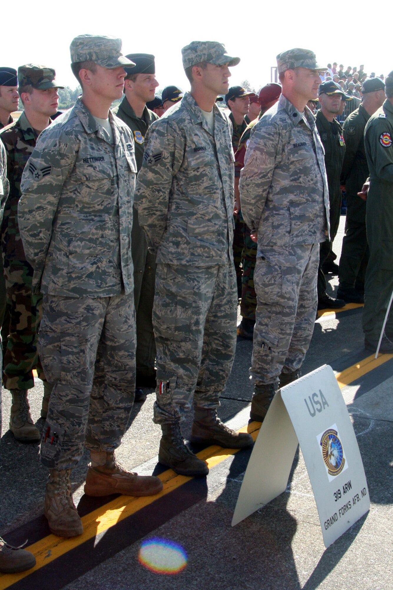 Members of the Grand Forks Air Force Base, N.D., team prepare for opening ceremonies for Air Mobility Command's RODEO 2009 July 19 at McChord Air Force Base, Wash.  More than 100 teams are participating in RODEO competition, including teams from seven foreign countries. RODEO is the U.S. Air Force's and AMC's premier air mobility competition. It's an international combat skills and flying operations competition designed to develop and improve techniques, procedures and interoperability with international partners to optimize mobility partnerships and enhance mobility operations. (U.S. Air Force Photo/Tech. Sgt. Scott T. Sturkol)