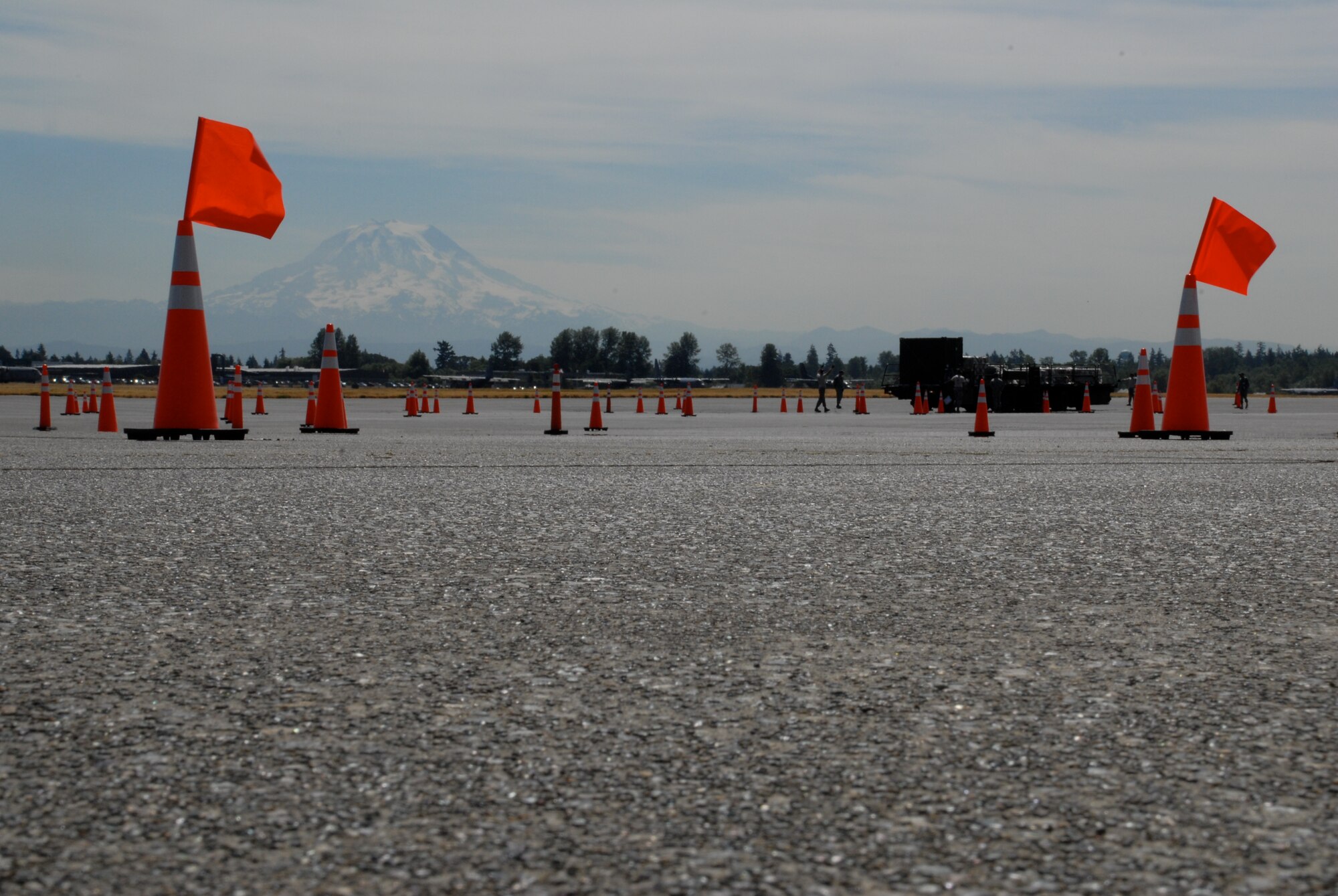 MCCHORD AIR FORCE BASE, Wash. – With a snow-covered Mount Rainier as a backdrop, 515th Air Mobility Operations Wing aerial porters compete in a 60,000-ton on/off loading event on the flightline here July 20. The team from Hickam Air Force Base, Hawaii, is comprised of aerial porters from all around the Pacific. They are competing against teams from around the world in the Air Mobility Rodeo 2009, July 19-25. (U.S. Air Force photo/Staff Sgt. Carolyn Viss)